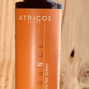 Bouteille après shampoing pour les boucles