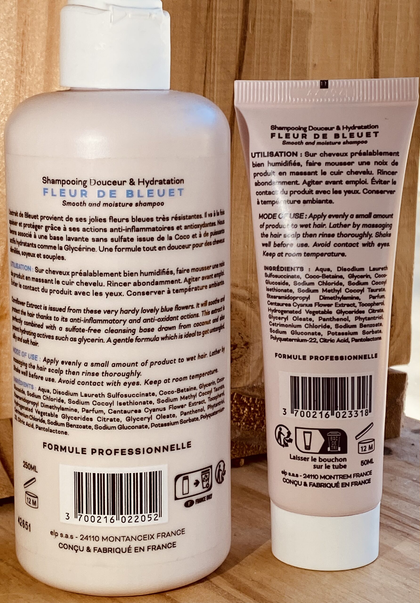 Dos bouteille de shampoing fleur de bleuet