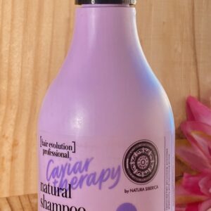 Bouteille de shampoing réparation et protection cheveux